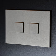 Interrupteur Mantagua 2 poussoirs en inox brossé rectangulaire, dimensions 92x62x13 mm.
