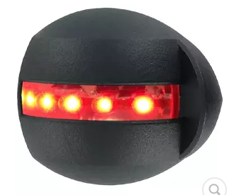 Feu latéral MANTAGUA 2MN bâbord rouge (112,5°) avec cache noir, de forme ronde et plate.